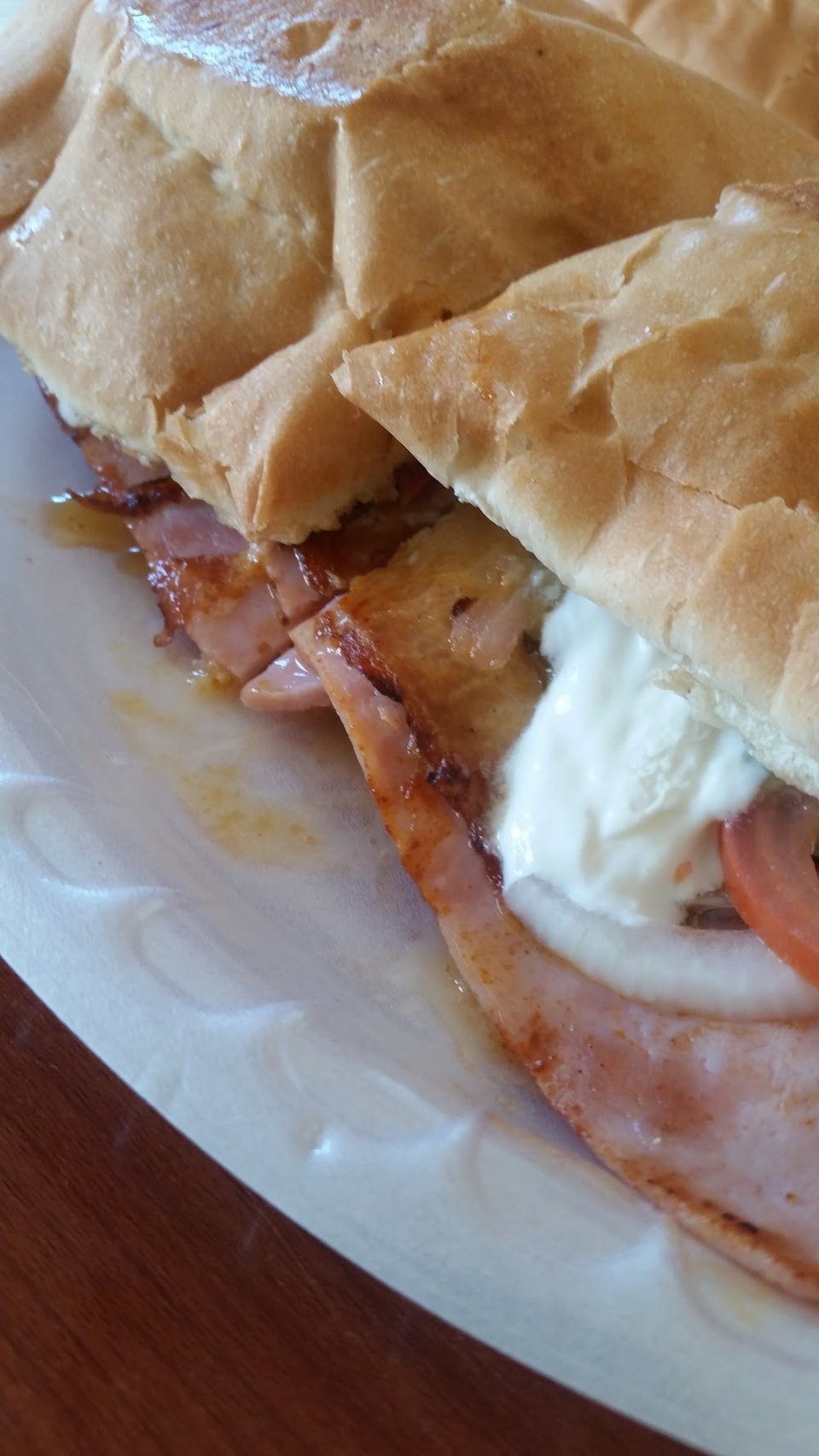 Tortas, tacos, and mariscos listed on paper.